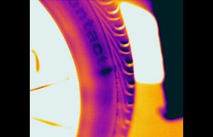 IR 20110823 0175 0 300x193 - Infrared image of a bubble in the side wall of a car tire. The bubble is the dark oval shape after the letter "T" - Infrared Imaging Services LLC